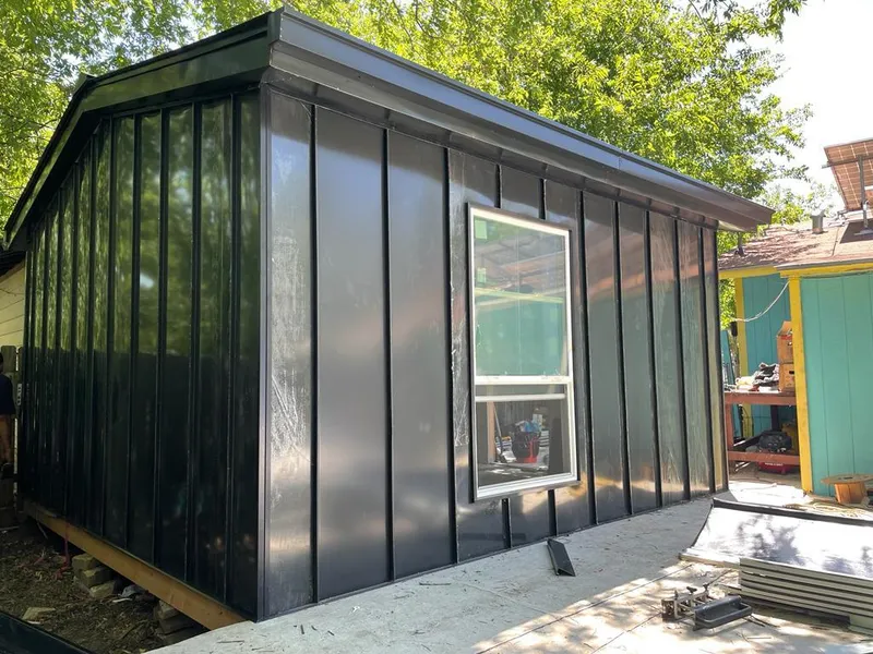 Black standing seam metal wall panels for Roof Inspection in Charter Oak