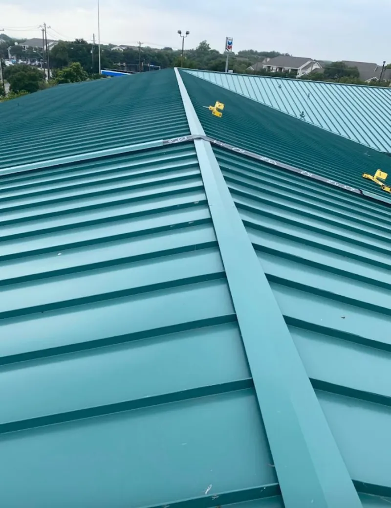 Green commercial metal roof ridge and valley for Metal Roof Repair in Charter Oak